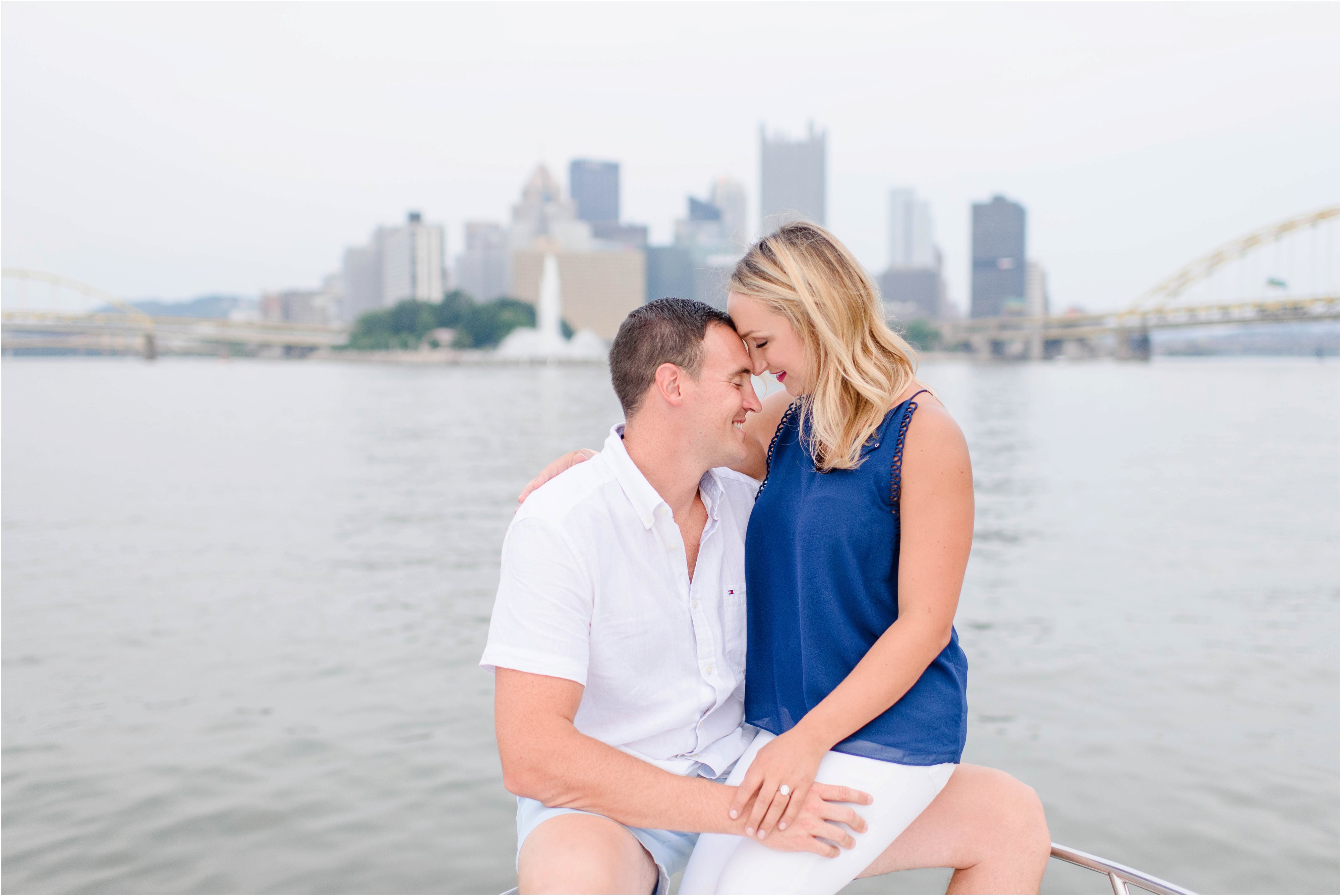 engagement pictures on a boat in pittsburgh